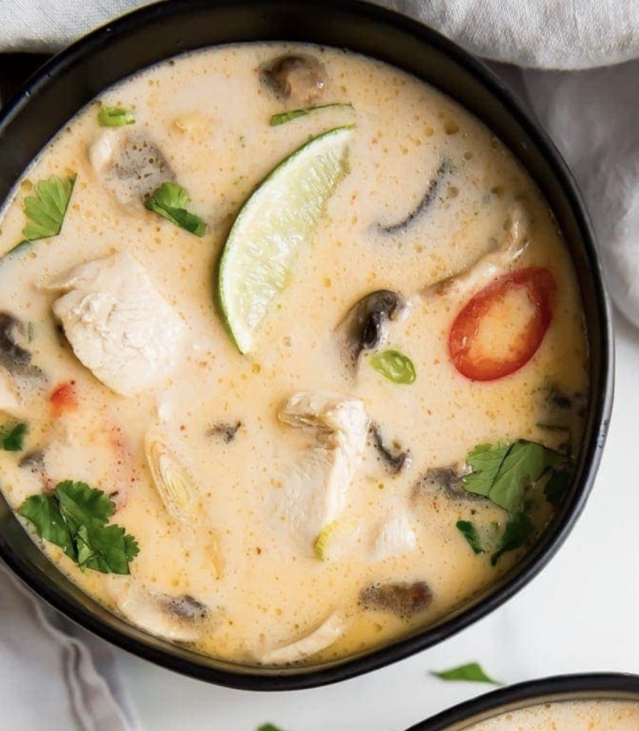 Tom Kha Gai soup chicken and coconut milk Thai soup for a large family spring dinner