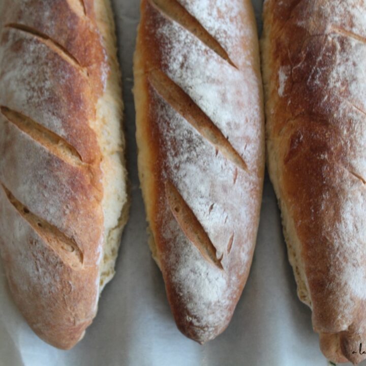 3 loaves of easy no knead sourdough baguettes fresh from the oven